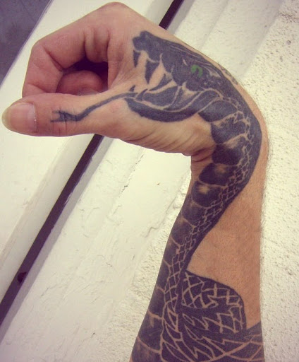 101 Ideas de Tatuajes de Serpientes y sus Significados 8