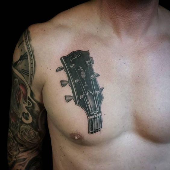 Tatuajes de Notas Musicales e Instrumentos 36