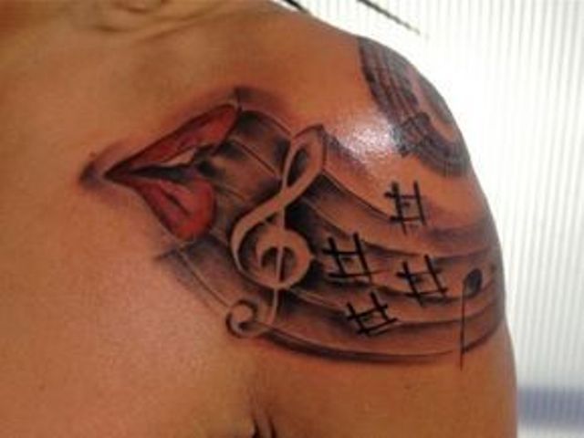 Tatuajes de Notas Musicales e Instrumentos 39