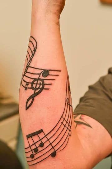Tatuajes de Notas Musicales e Instrumentos 26