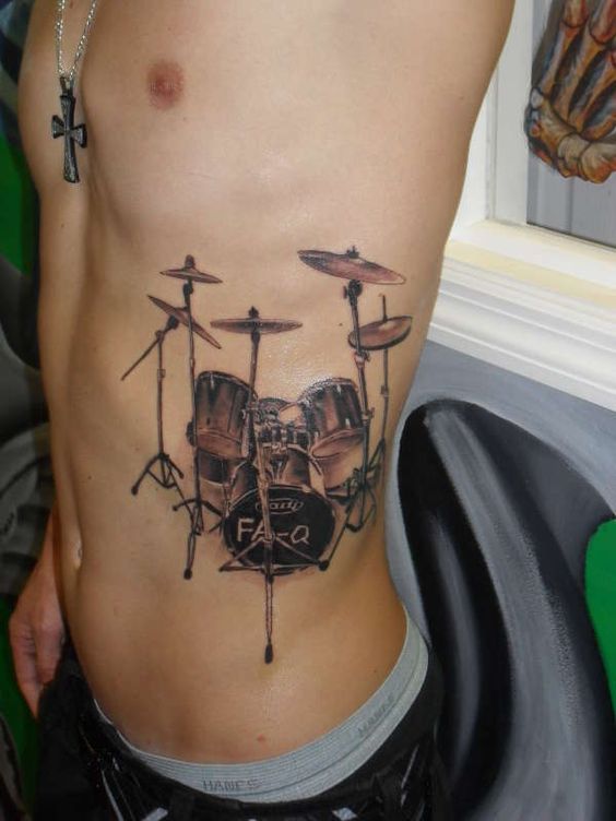 Tatuajes de Notas Musicales e Instrumentos 31 Tatuajes de Notas Musicales e Instrumentos 31