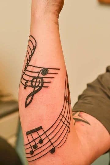 Tatuajes de Notas Musicales e Instrumentos 26 Tatuajes de Notas Musicales e Instrumentos 26