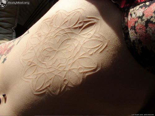 Escarificación: los tatuajes cicatrices 29