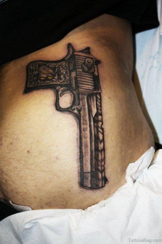 Ideas de Tatuajes de Pistolas: Símbolos de Poder 55