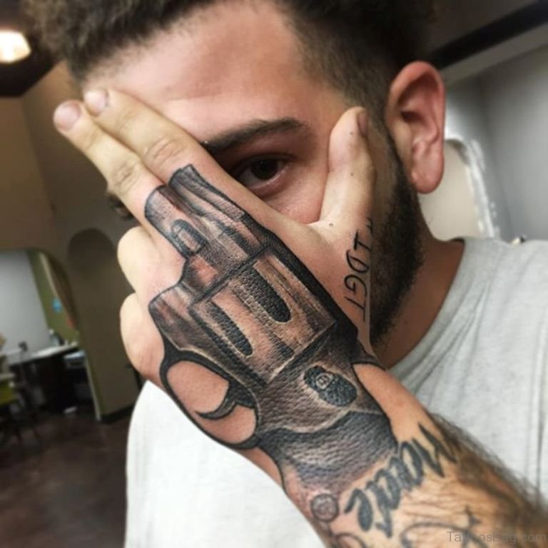 Ideas de Tatuajes de Pistolas: Símbolos de Poder 2 Ideas de Tatuajes de Pistolas: Símbolos de Poder 2